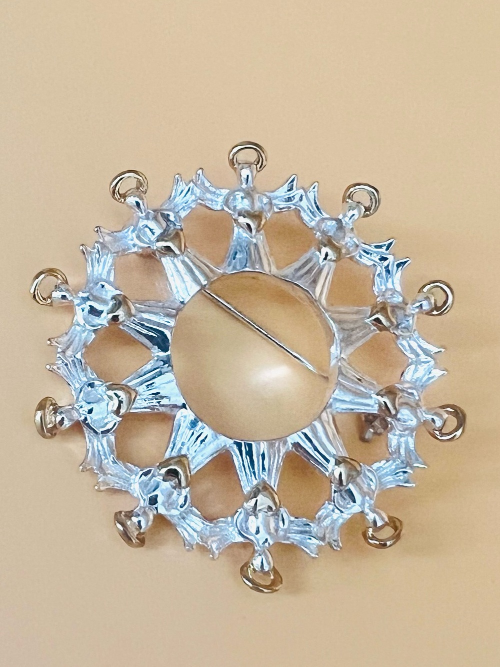 Silver Snowflake Angels Brooch with gold tone halo